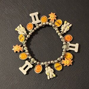 Stretchy Silver Gemini Zodiac Charm Bracelet with Orange/Yellow Accents